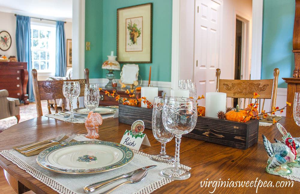 Thanksgiving table set with Lenox Autumn dishes, Gorham Golden Ribbon Edge silverware, vintage crystal, and vintage turkeys.