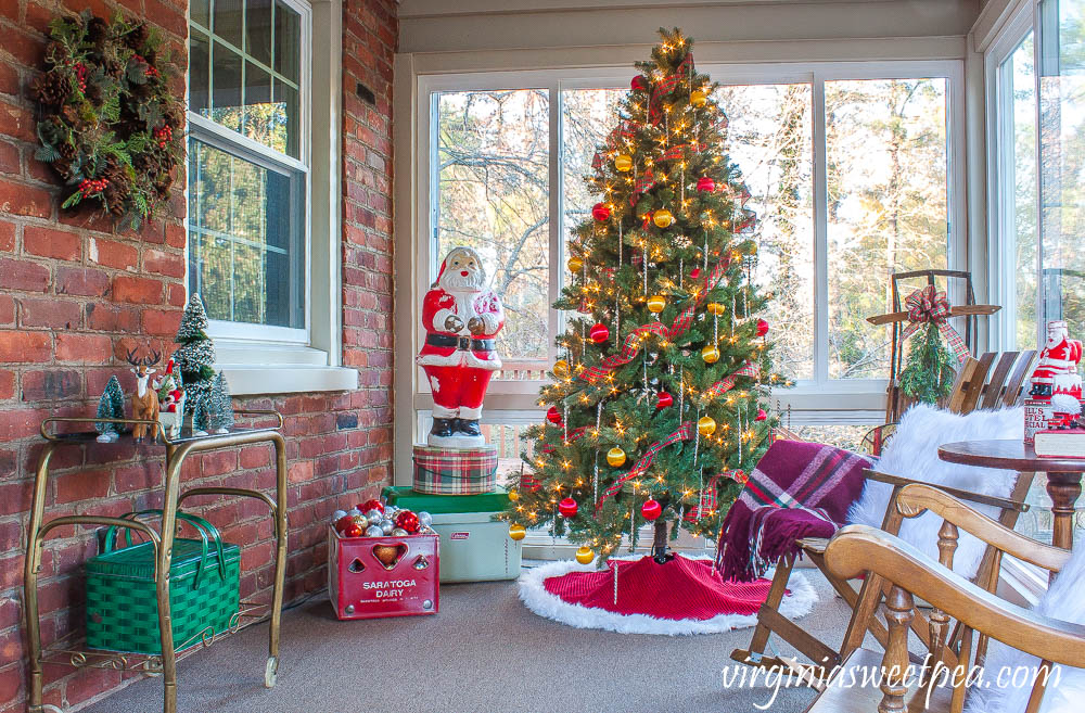 Sunroom decorated for Christmas with vintage.