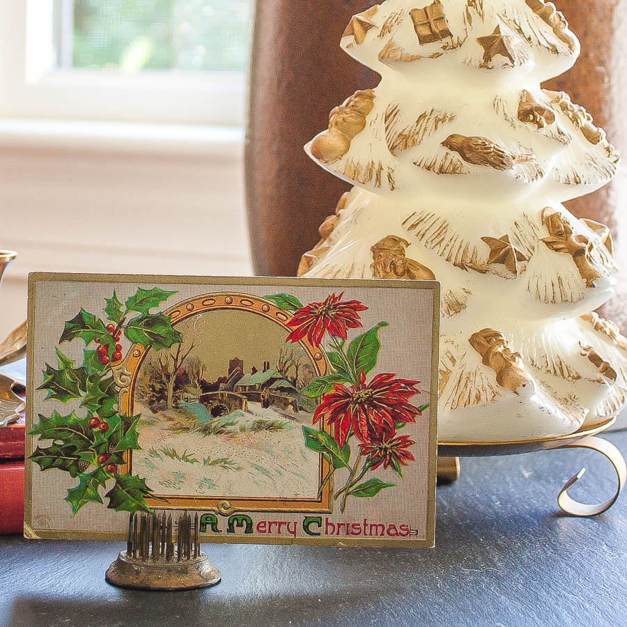 Early 1900's Christmas postcard and a vintage Christmas tree candle