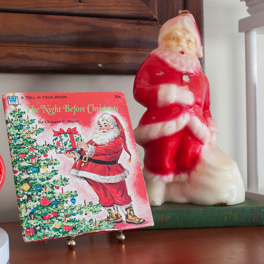 1976 The Night Before Christmas Book and a vintage Santa candle