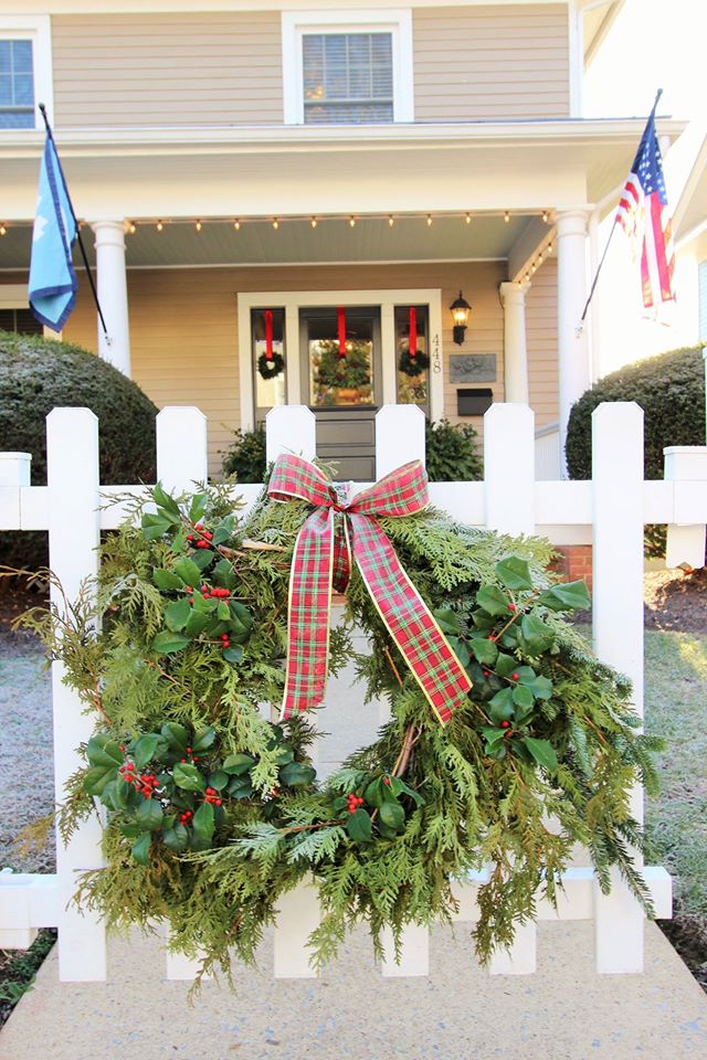 Live greenery wreath made with pine and holly.