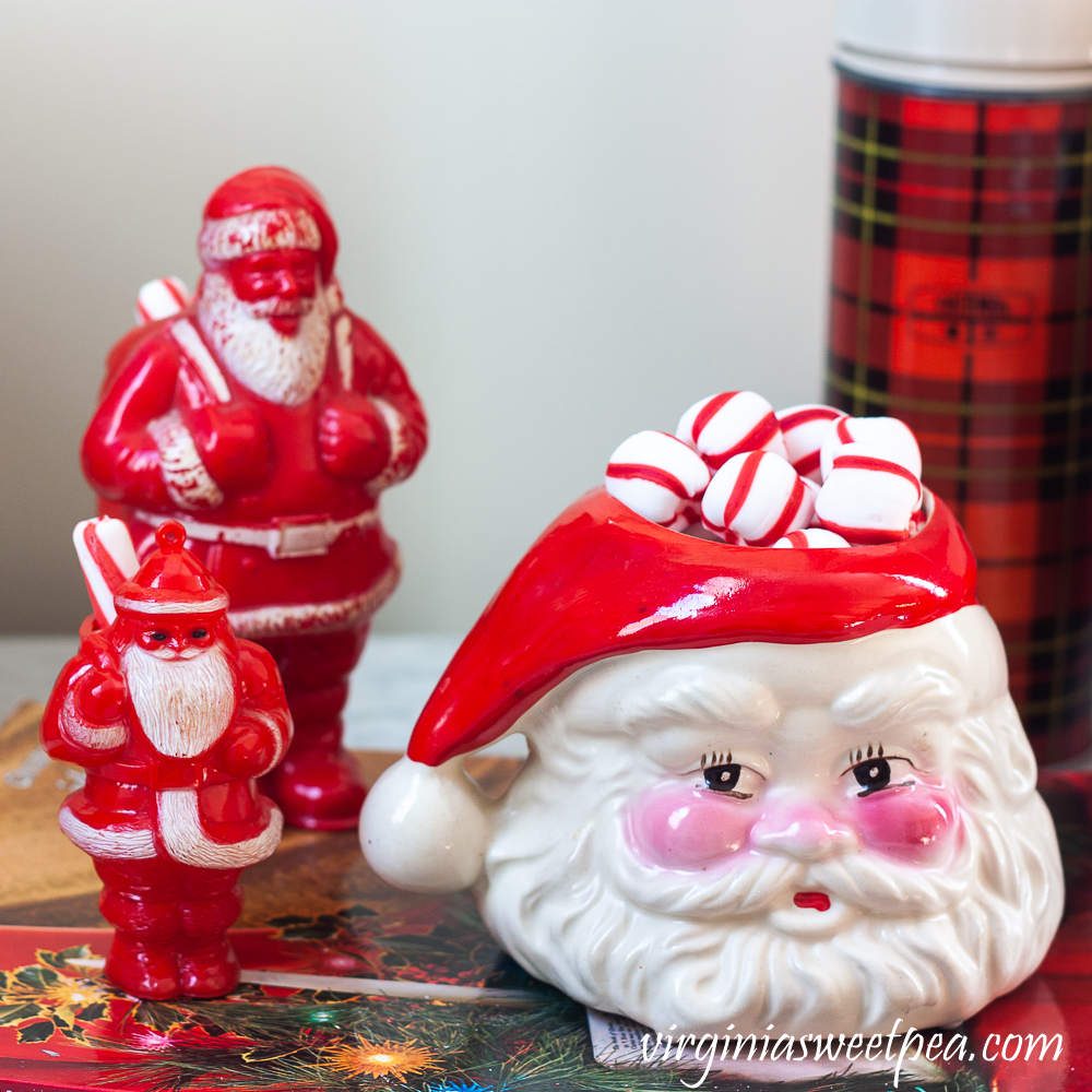 Vintage plastic Santa candy holders and a vintage Santa mug