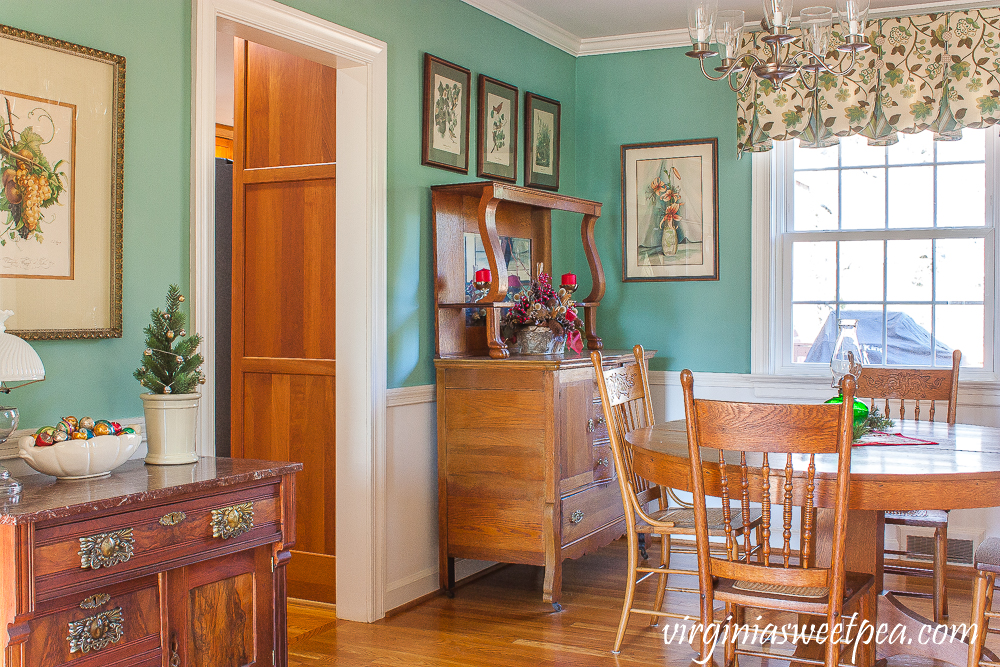 A Very Vintage Christmas in the Dining Room - A dining room is decorated for Christmas with vintage.