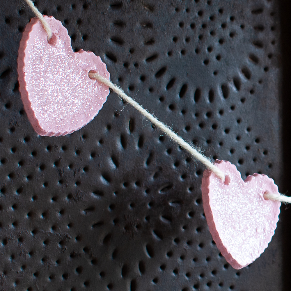 Heart garland on an antique pie safe.