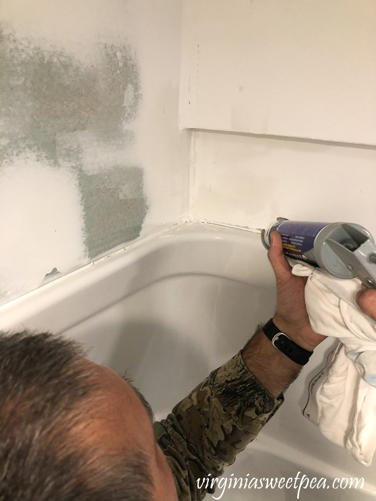 Caulking a shower