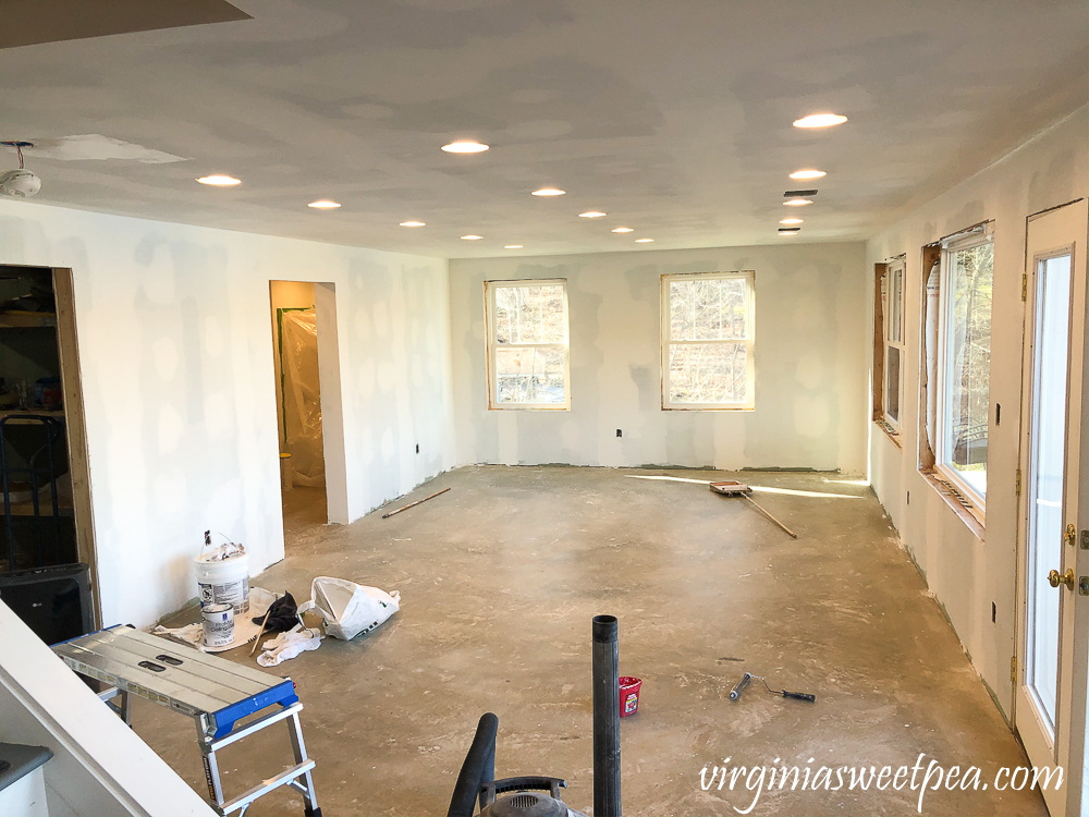 Basement after walls and ceiling were primed with Kilz.