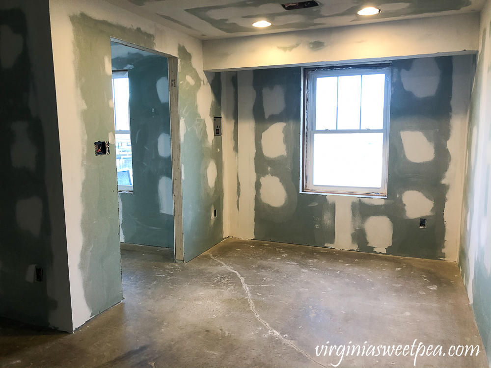 Basement after drywall has been taped, mudded, and sanded