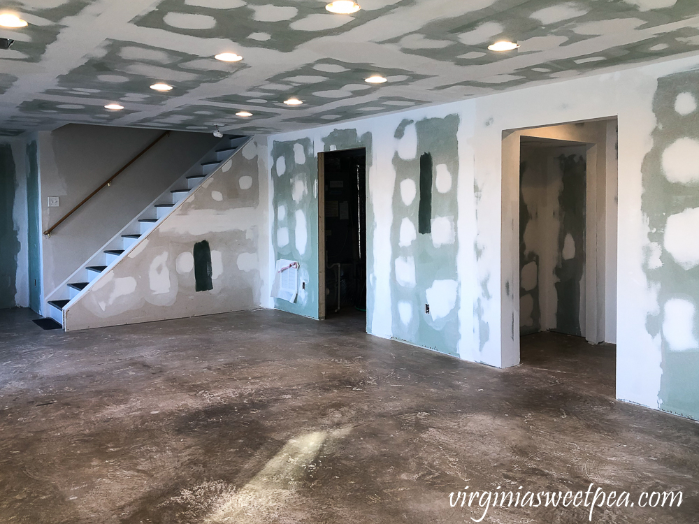 Basement after drywall has been taped, mudded, and sanded