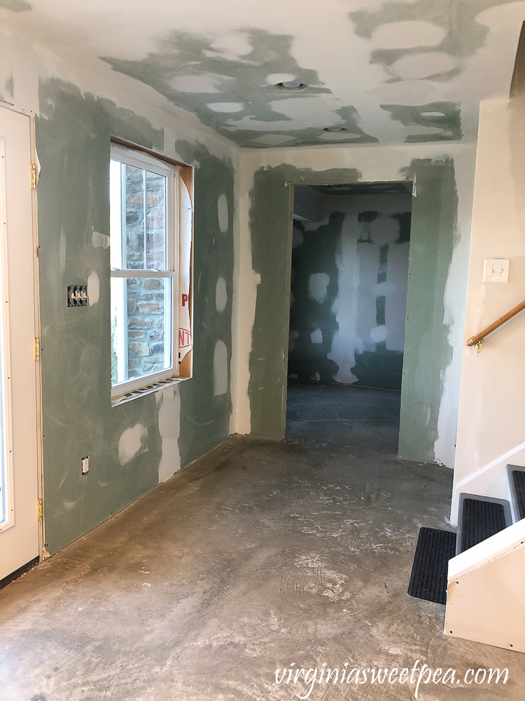 Basement after drywall has been taped, mudded, and sanded