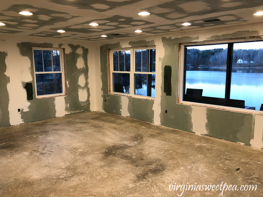 Basement after drywall has been taped, mudded, and sanded