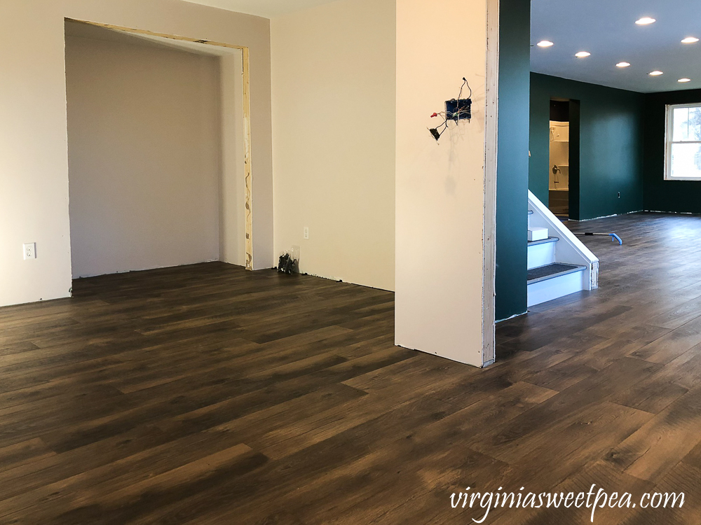 Mohawk Crest Loft flooring in Prairie Oak and Sherwin Williams Emerald Paint in Cultured Pearl