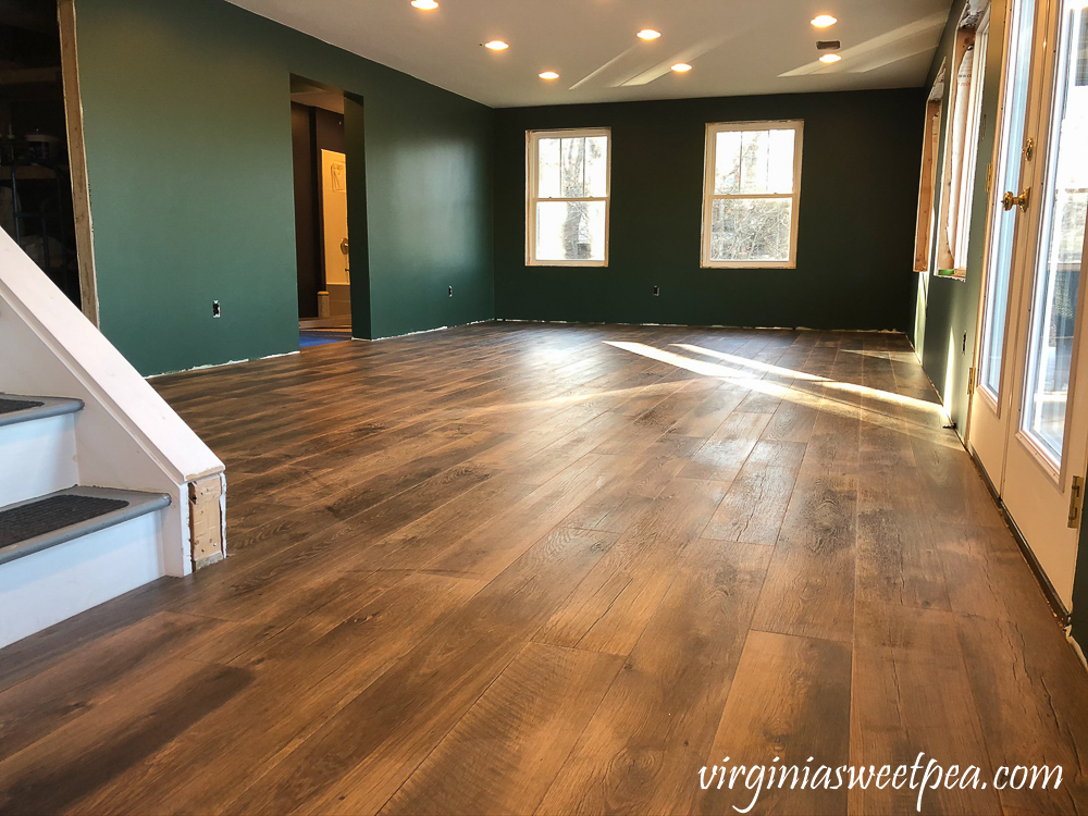 Mohawk Crest Loft flooring in Prairie Oak and Sherwin Williams Emerald Paint in Rock Garden