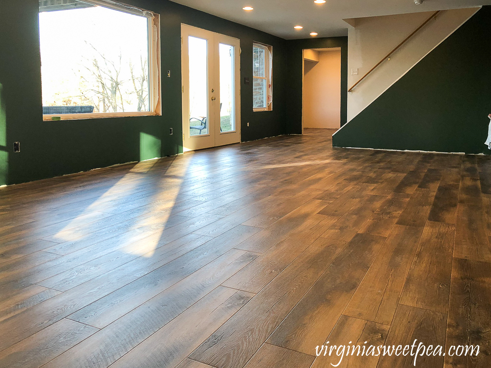 Mohawk Crest Loft flooring in Prairie Oak and Sherwin Williams Emerald Paint in Rock Garden