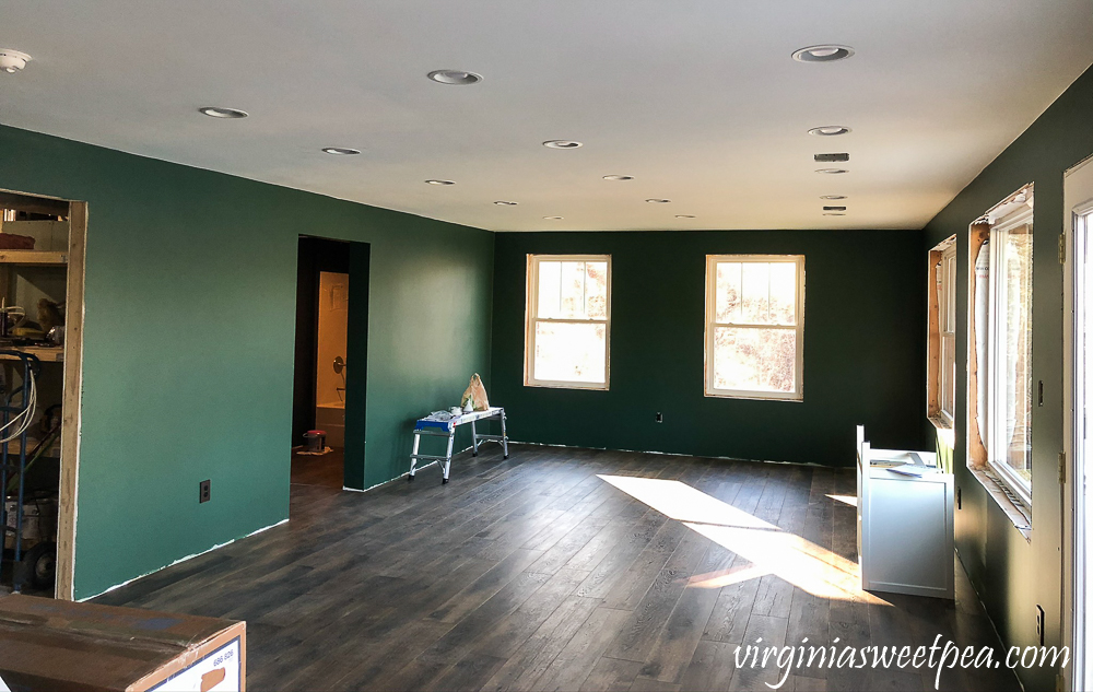 Mohawk Crest Loft flooring in Prairie Oak and Sherwin Williams Emerald Paint in Rock Garden