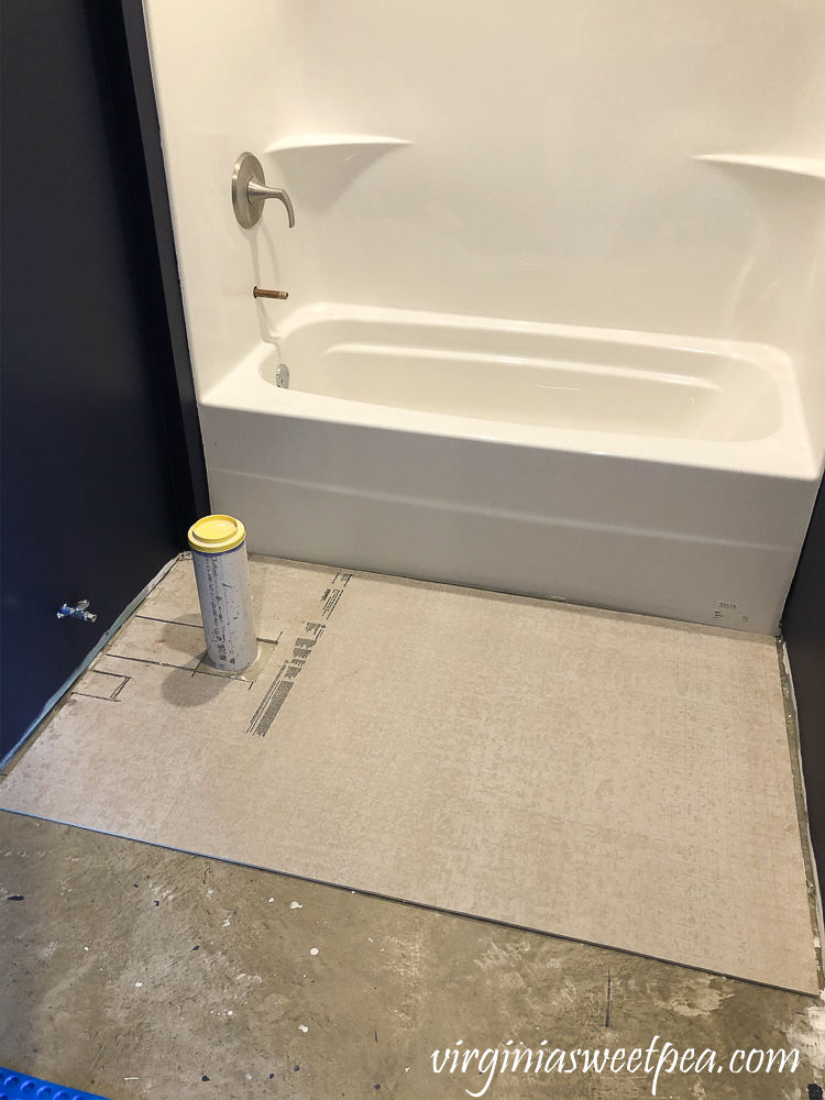 Adding underlayment under toilet before vinyl floor installation