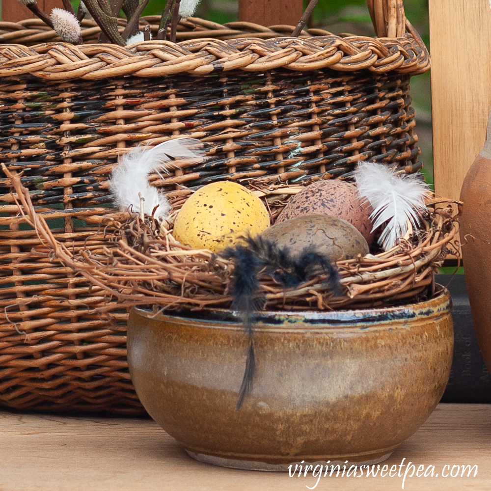 Nests with eggs in a pottery bowl