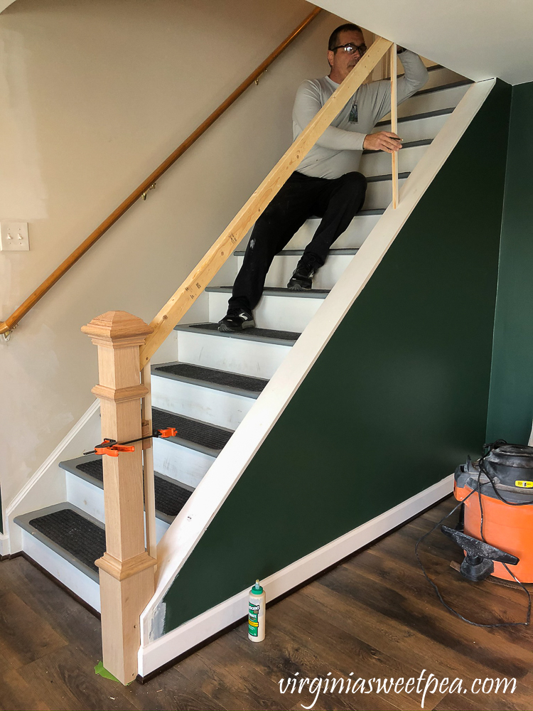 Installing a banister on a set of stairs