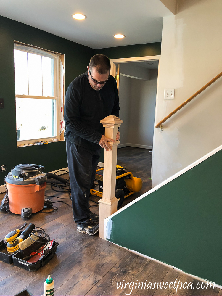 Installing a newel post at the bottom of a set of stairs