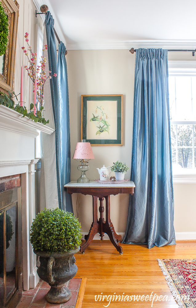 Living room decorated for spring with pink and green