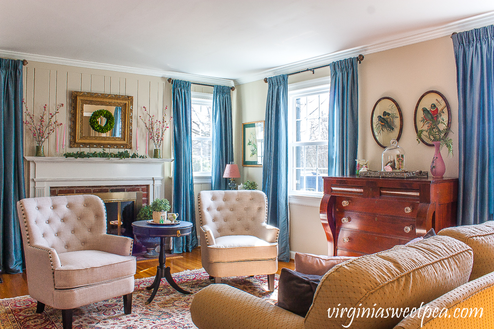 Living room decorated for spring with pink and green