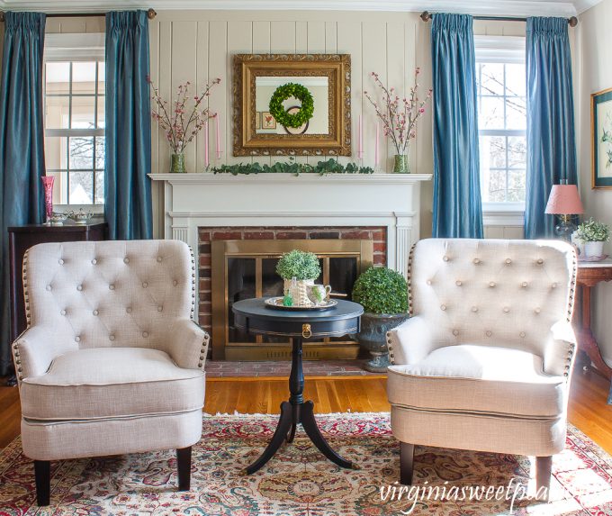Living room decorated for spring with pink and green