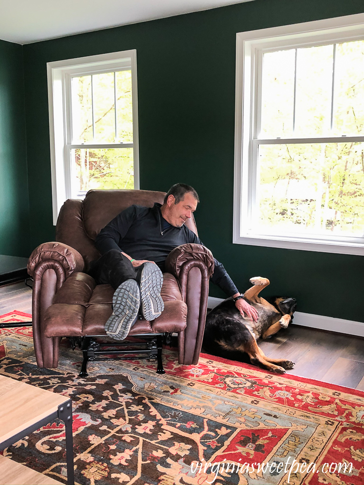 Relaxing in a recliner in a lake house basement