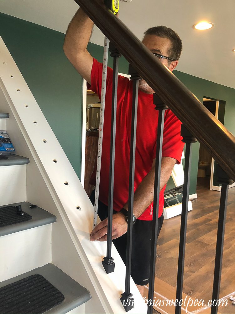 Installing metal balusters on a staircase