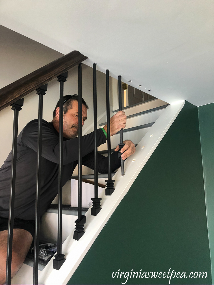 Installing metal balusters on a staircase