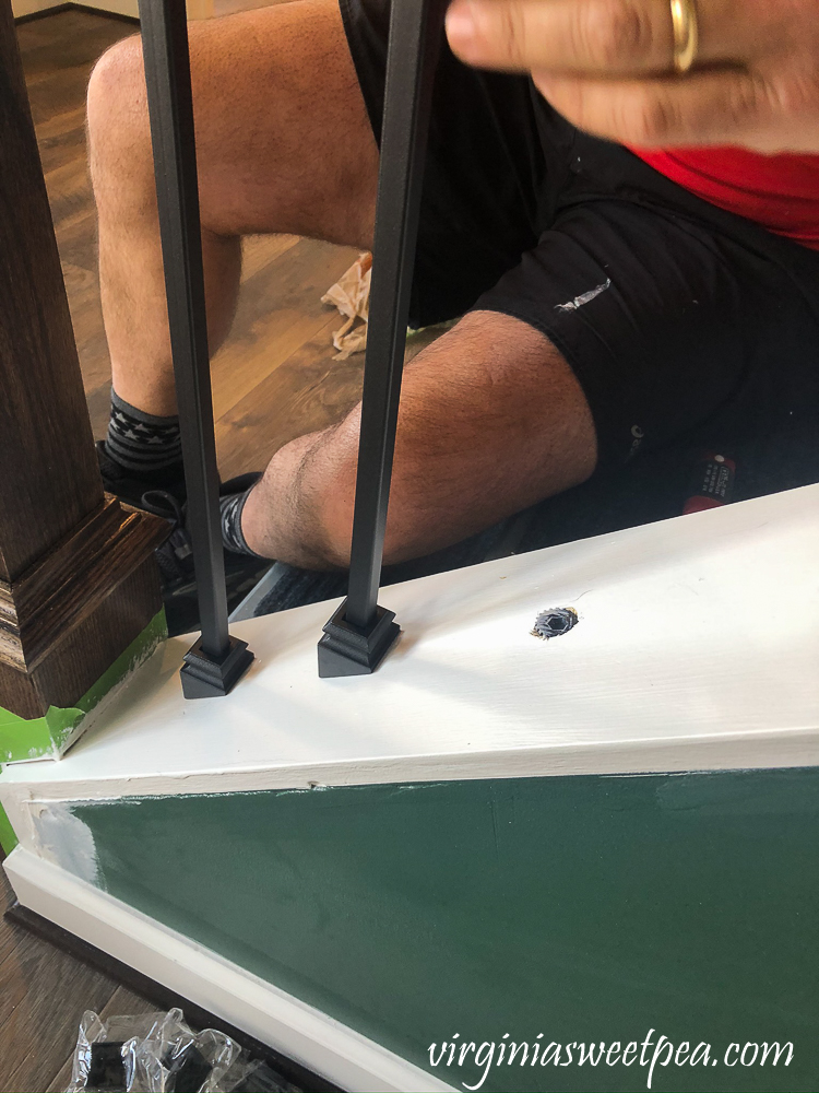 Installing metal balusters on a staircase