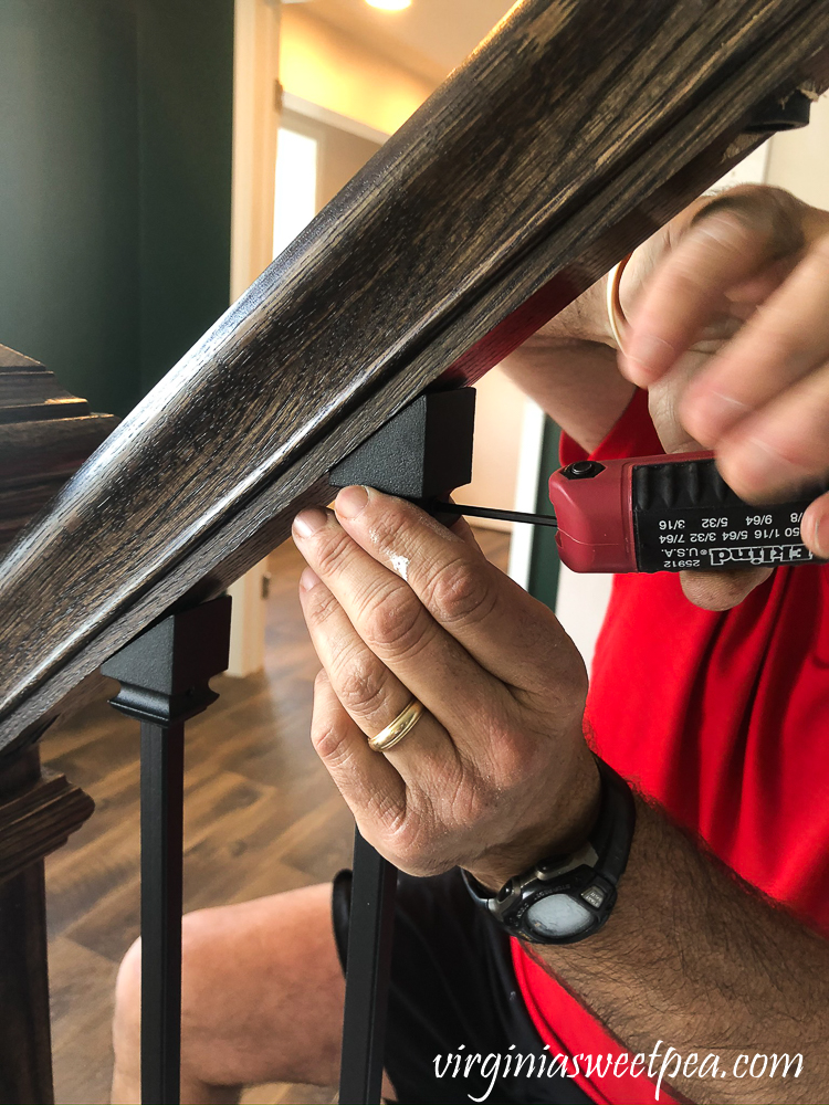 Installing metal balusters on a staircase