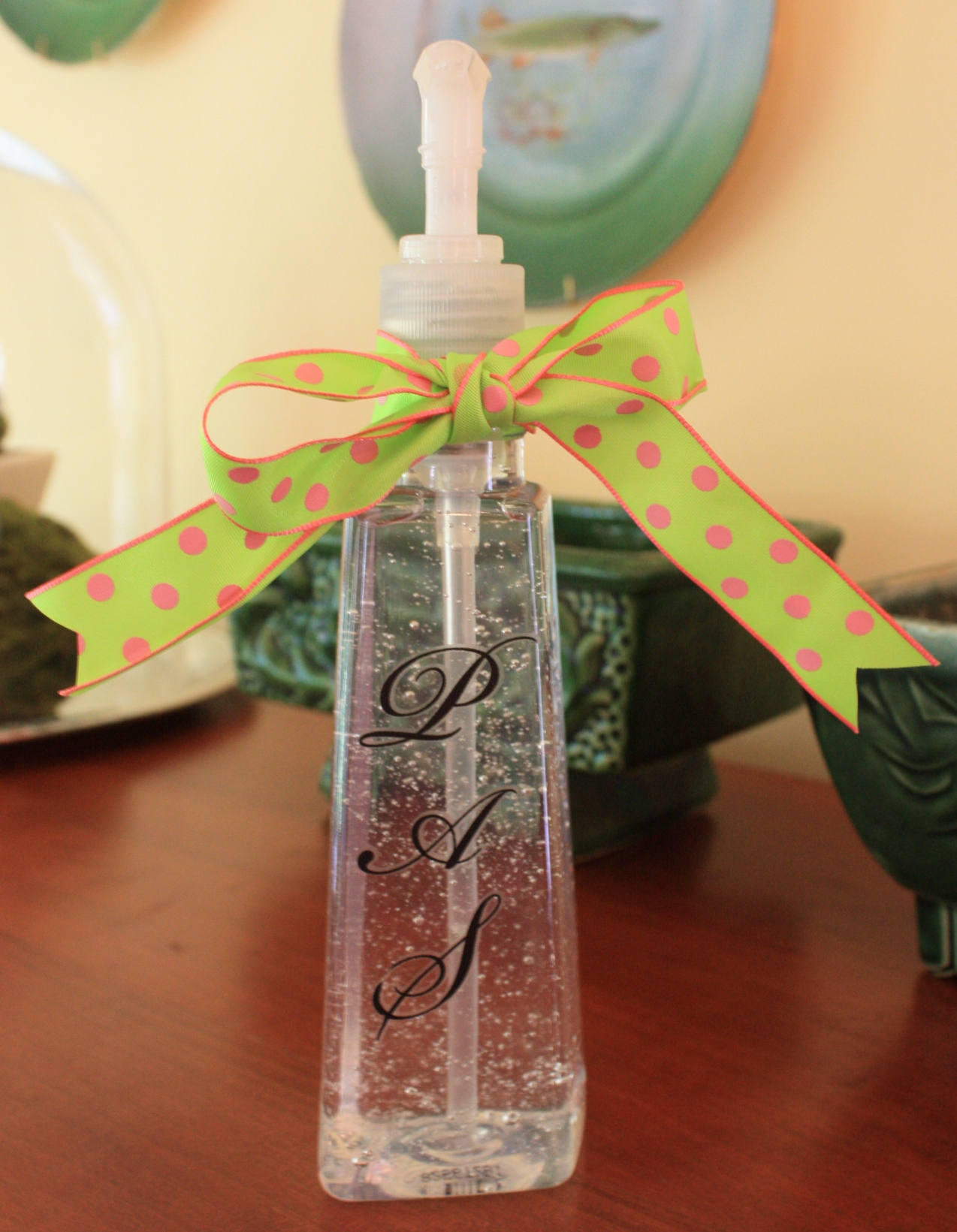 Repurposed Soap Container embellished with rub-on initials and a ribbon