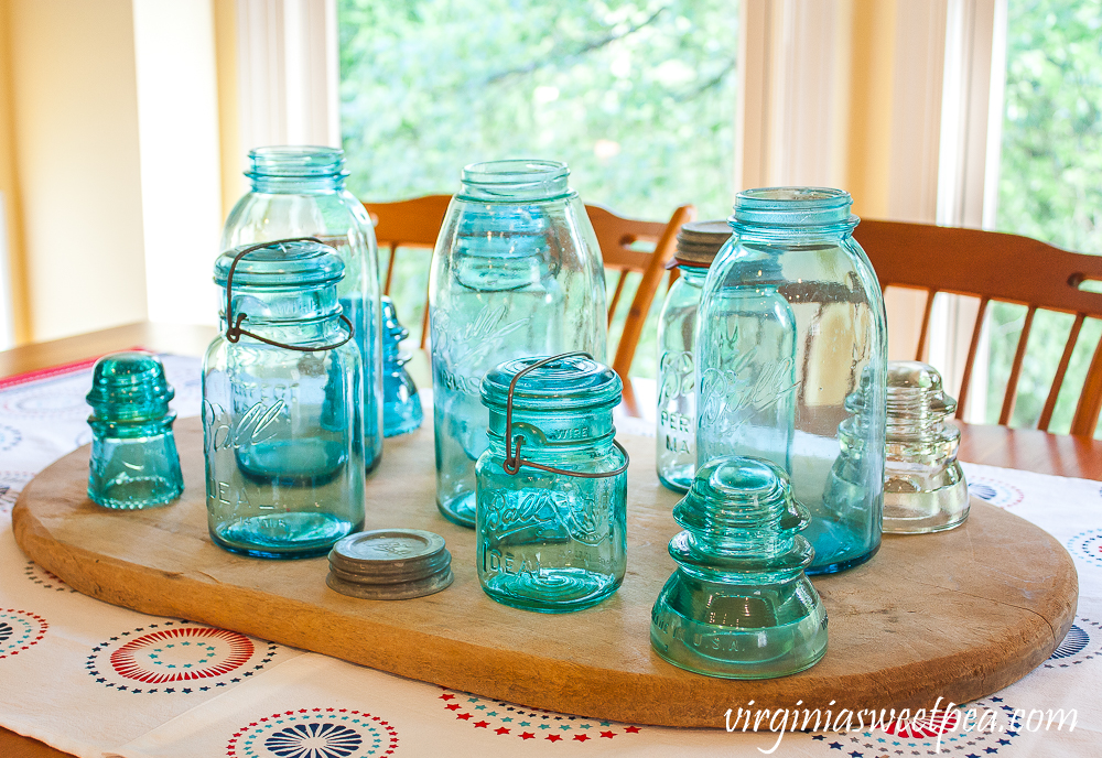 Centerpiece with Vintage Ball Jars and Insulators