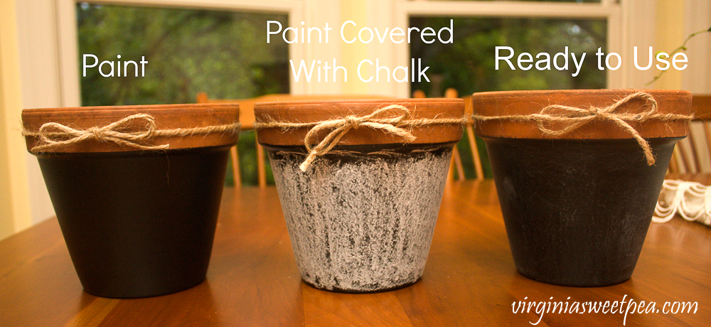 three pots painted with chalkboard paint