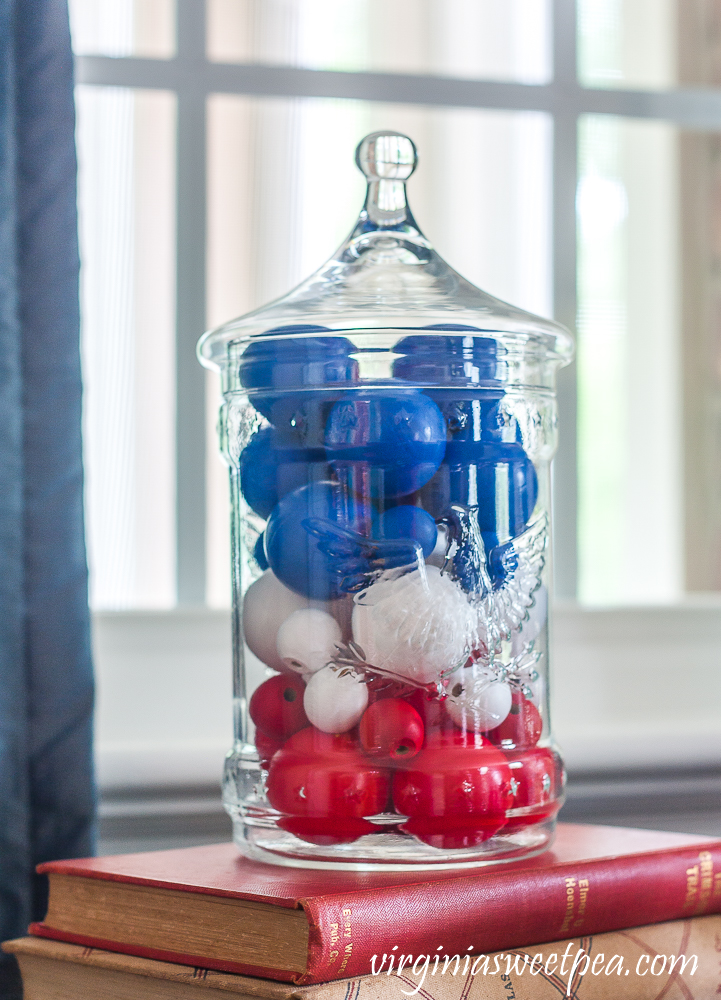 Patriotic Vignette with 1976 eagle jar with red, white, amd blue filler made from wood beads and ping-pong balls