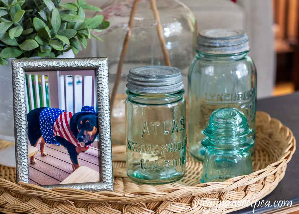 Vintage Atlas Mason Jar and Lynchburg Standard Mason Jar and a Vintage Insulator with a picture of a dog in an Uncle Sam costume