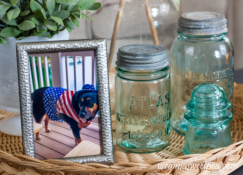 Vintage Atlas Mason Jar and Lynchburg Standard Mason Jar and a Vintage Insulator with a picture of a dog in an Uncle Sam costume