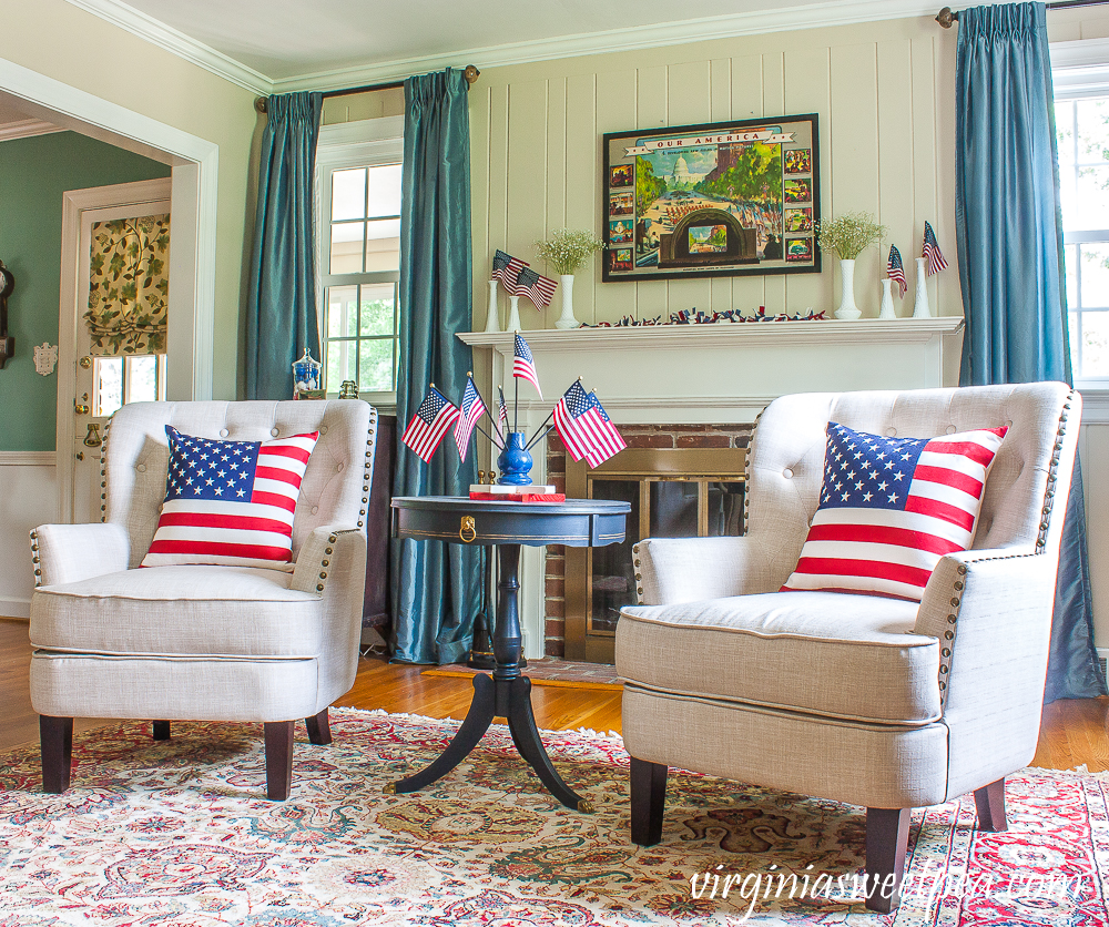 Living room and mantel decorated patriotically with vintage.