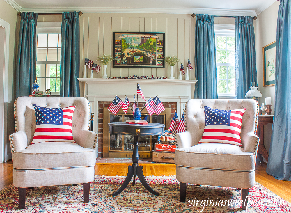 Living room and mantel decorated patriotically with vintage.