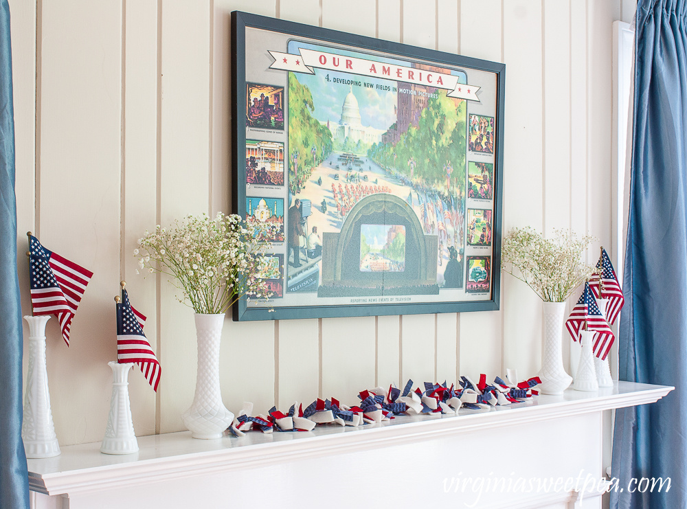 Living room and mantel decorated patriotically with vintage.