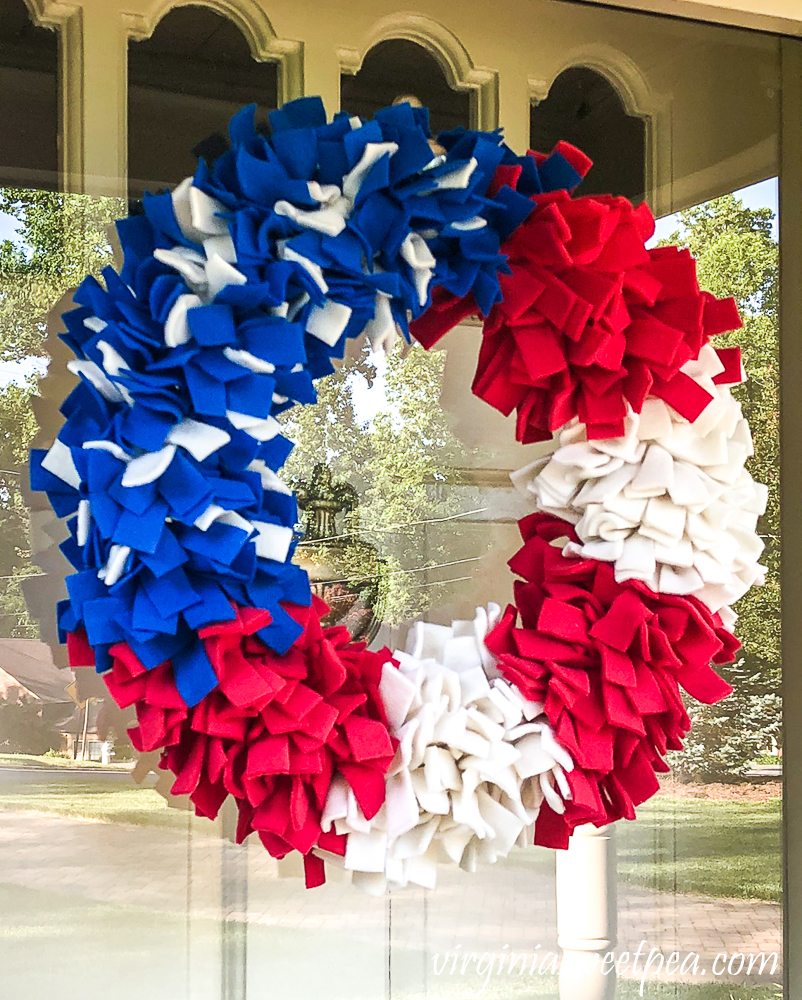 Red, white, and blue rag wreath made with fleece.