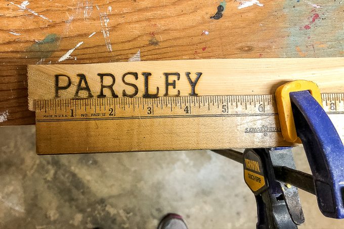 Tutorial to make plant markers using wooden shims and a wood burning tool kit.