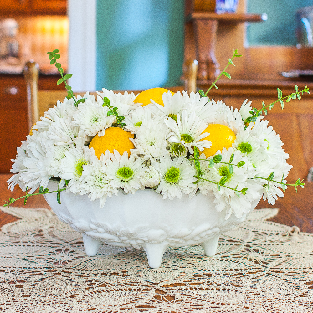 Summer flower arrangement with Chrysanthemums and lemons