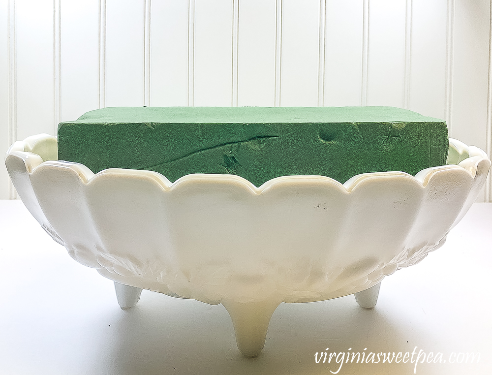 Oasis in a milk glass Indiana fruit bowl