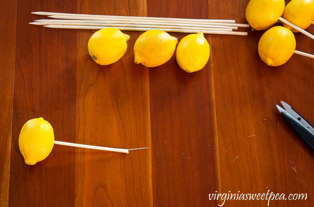 Lemons on a skewer for a flower arrangement
