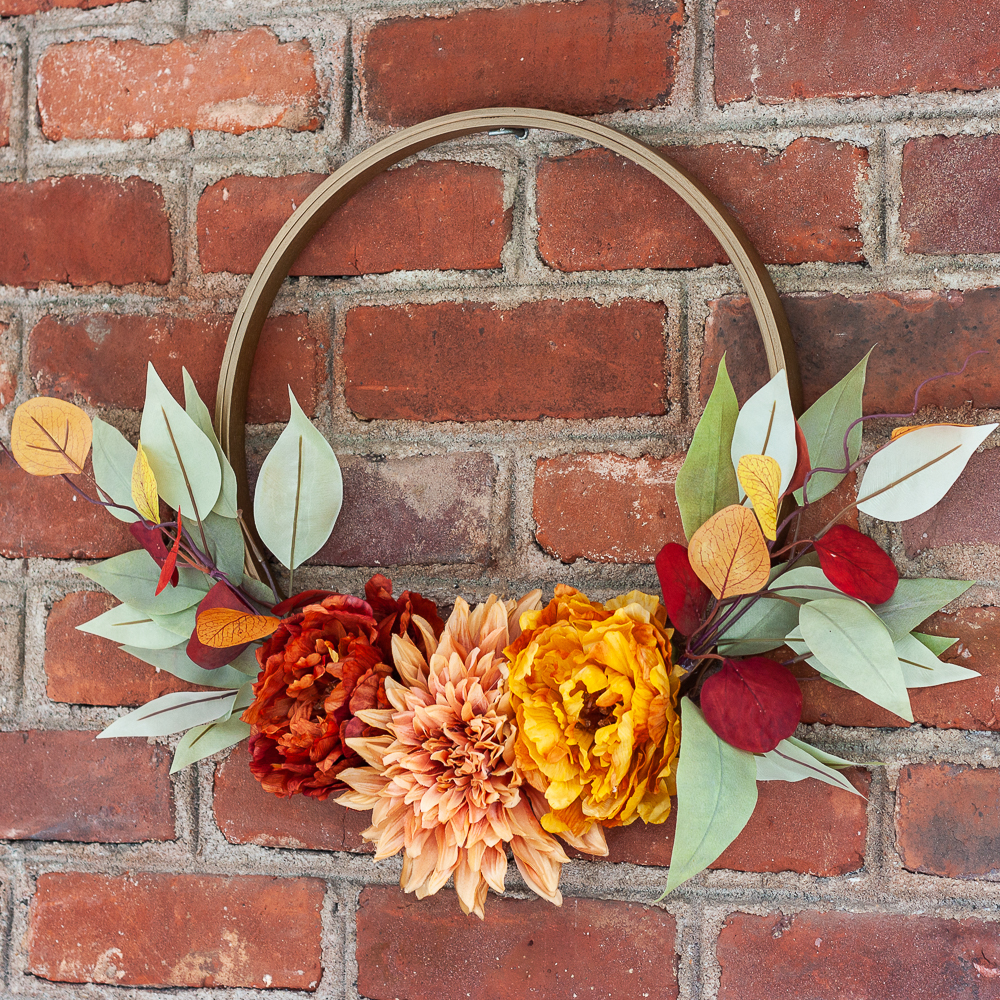 Fall wreath made with a quilter's hoop and fall florals