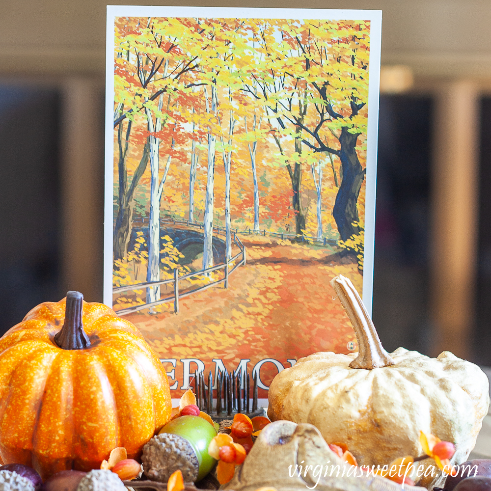 Fall Vermont postcard with a faux pumpkin, preserved gourd, acorns, and bittersweet