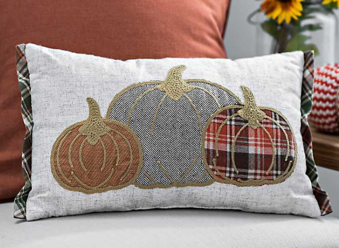 Fall pillow with three pumpkins and plaid trim