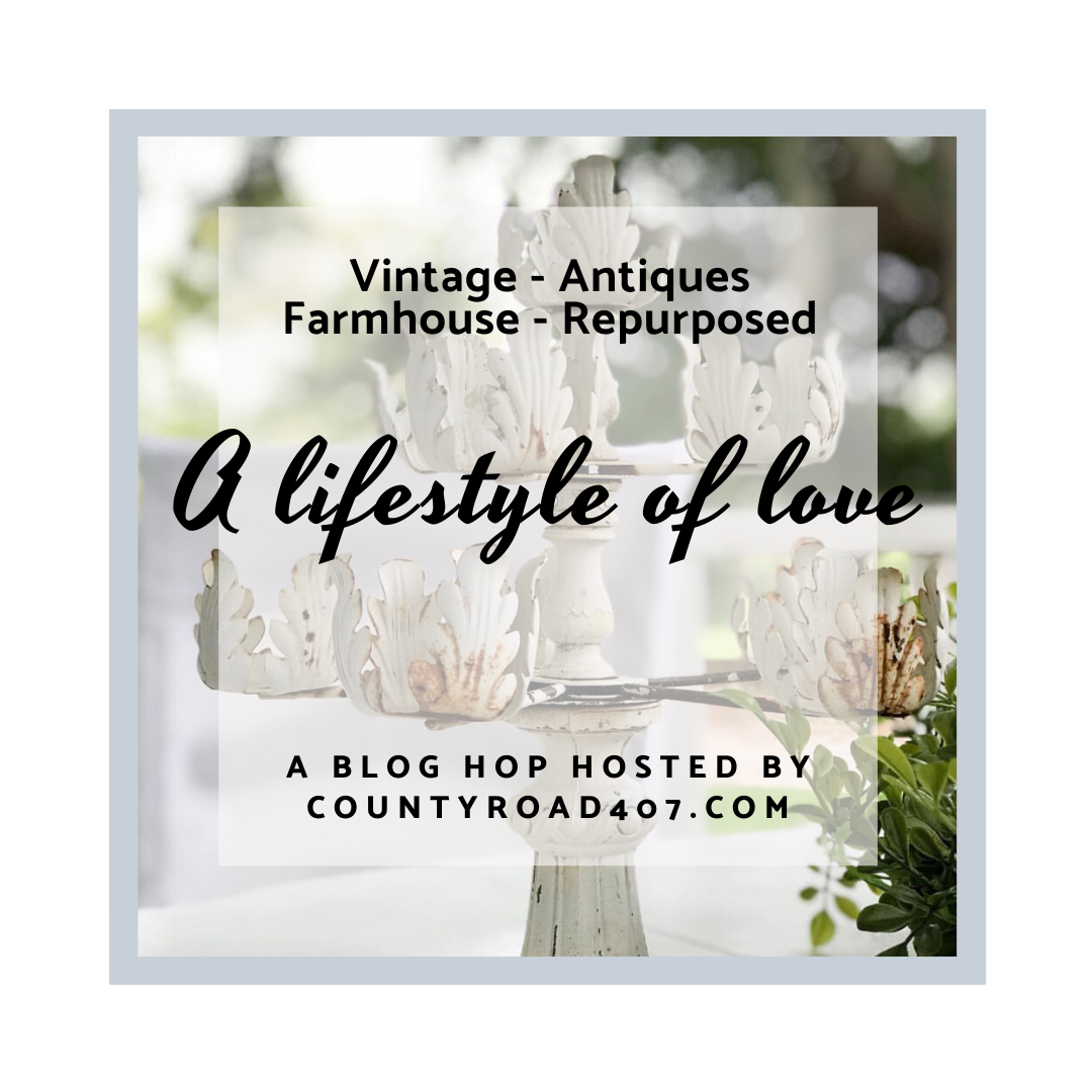 Graphic for blog hop focusing on explaining how to use vintage items for home decor.