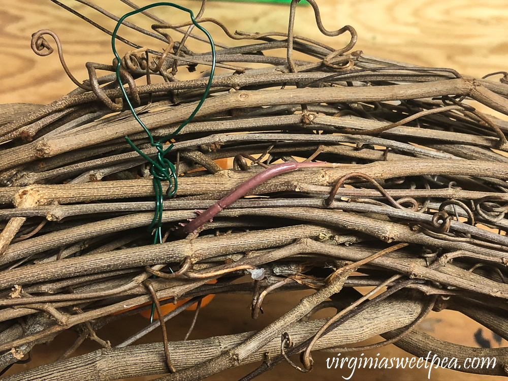 Grapevine wreath with wire hanger