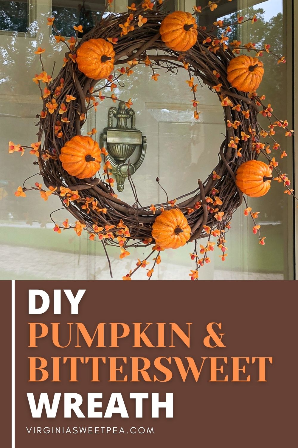 Grapevine wreath with pumpkins and bittersweet